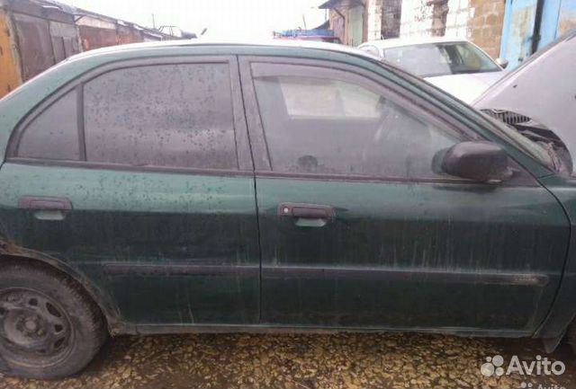 Двери Мицубиси Лансер 8