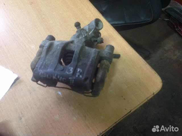 Суппорт задний правый Форд Фокус 2