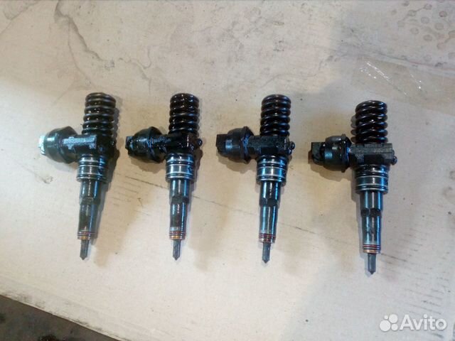 038130073AJ Насос форсунка audi VW seat skoda 1.9