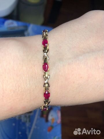 Золотой браслет с рубинами и бриллиантами Золотой браслет с рубинами и бриллиантами