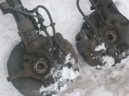 Поворотный кулак Mitsubishi Lancer 10