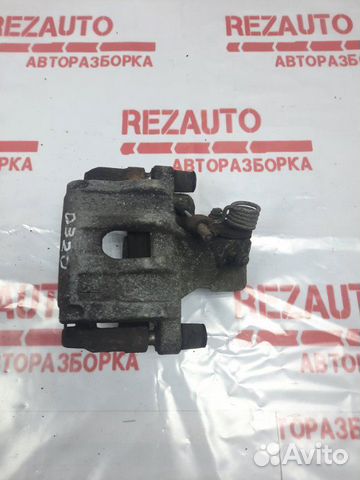 Суппорт тормозной задний левый Mazda Mazda3 BK Z6