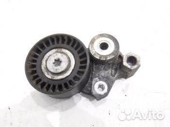 Натяжитель ремня Мазда