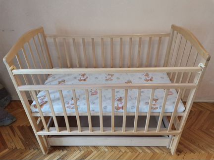 Детская кроватка, продольный маятник